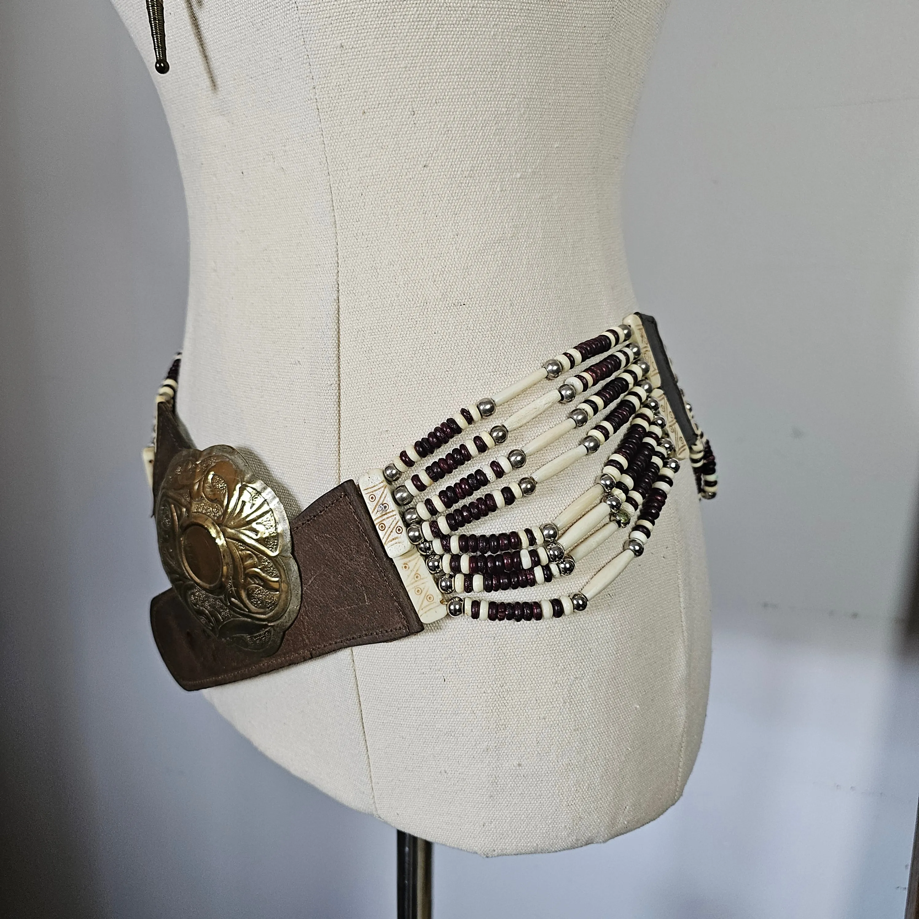 Vintage Native american buffalo bone belt M/L gold buckle silver edges.
