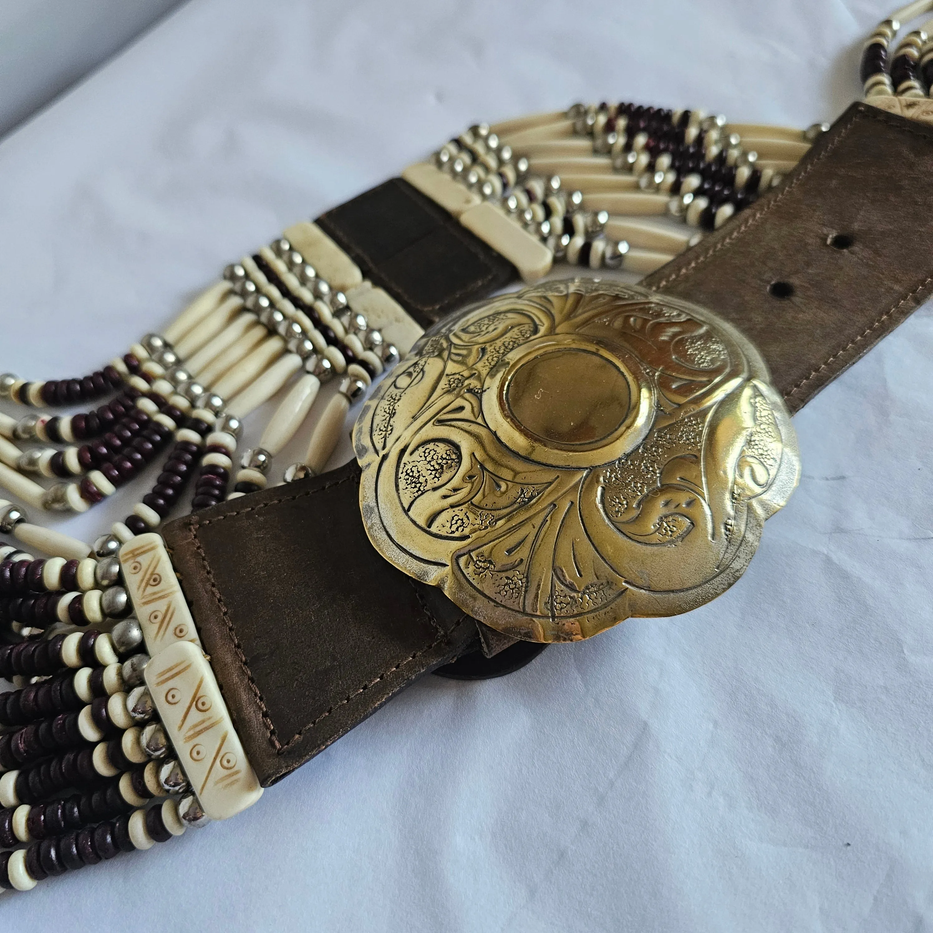 Vintage Native american buffalo bone belt M/L gold buckle silver edges.