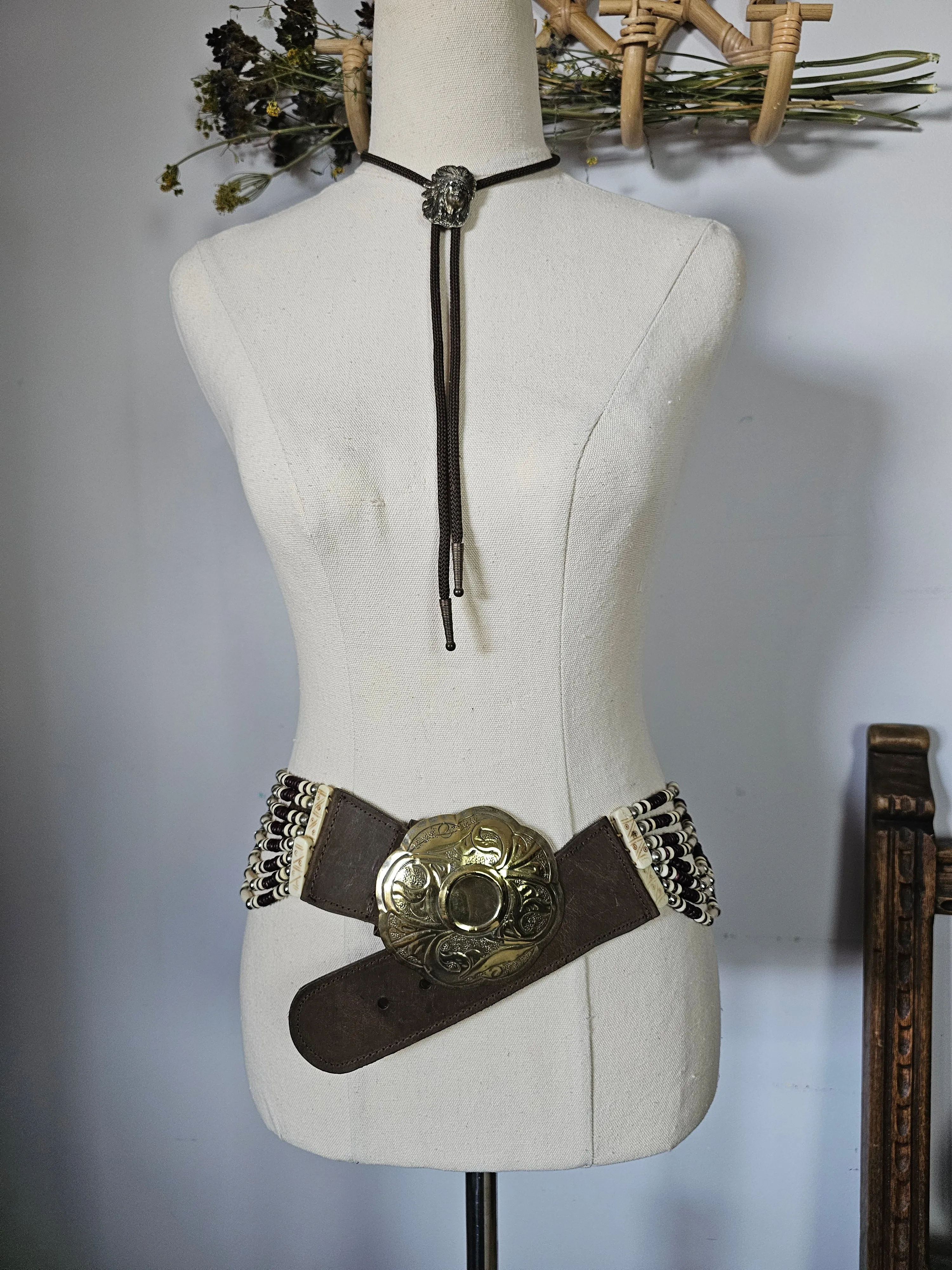 Vintage Native american buffalo bone belt M/L gold buckle silver edges.
