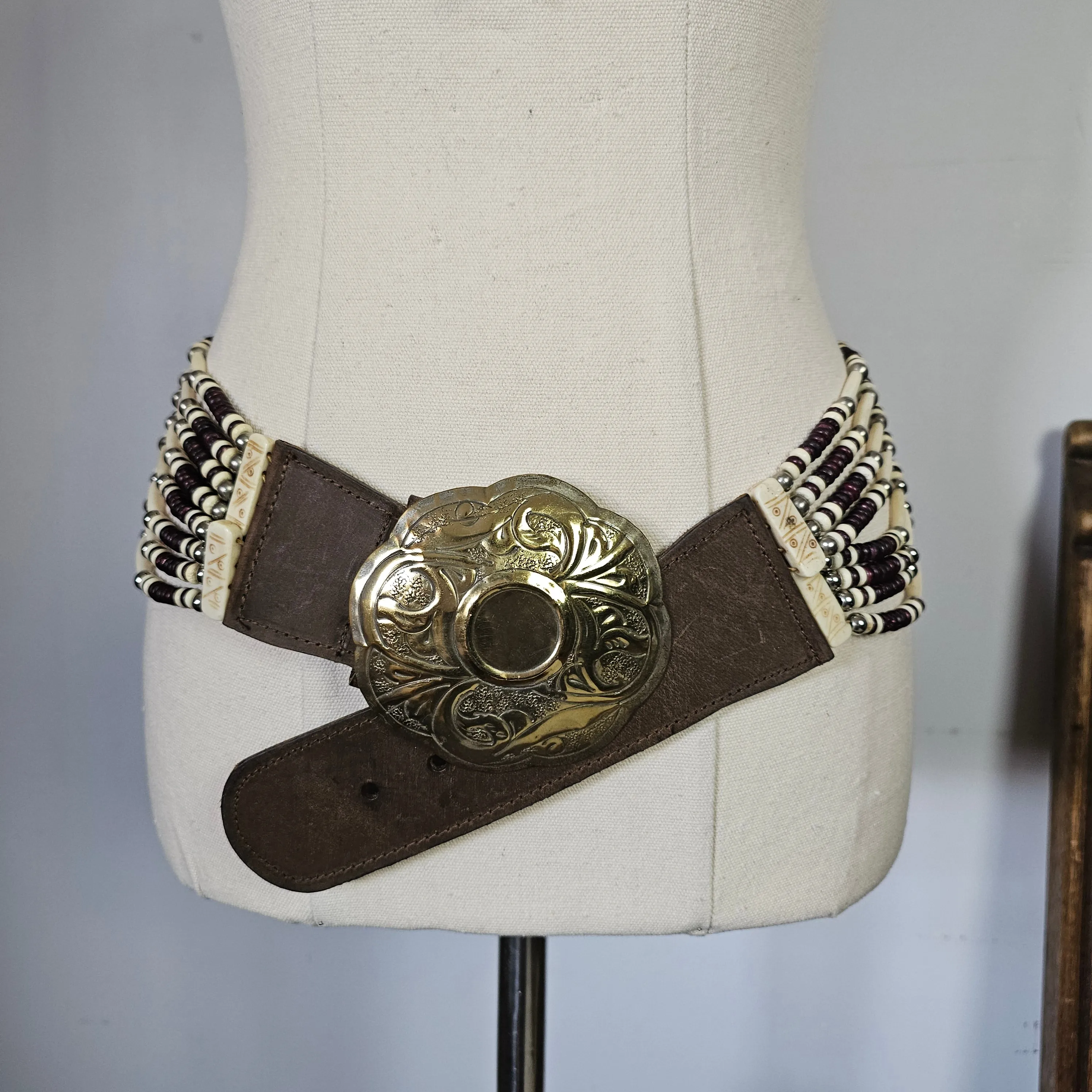 Vintage Native american buffalo bone belt M/L gold buckle silver edges.