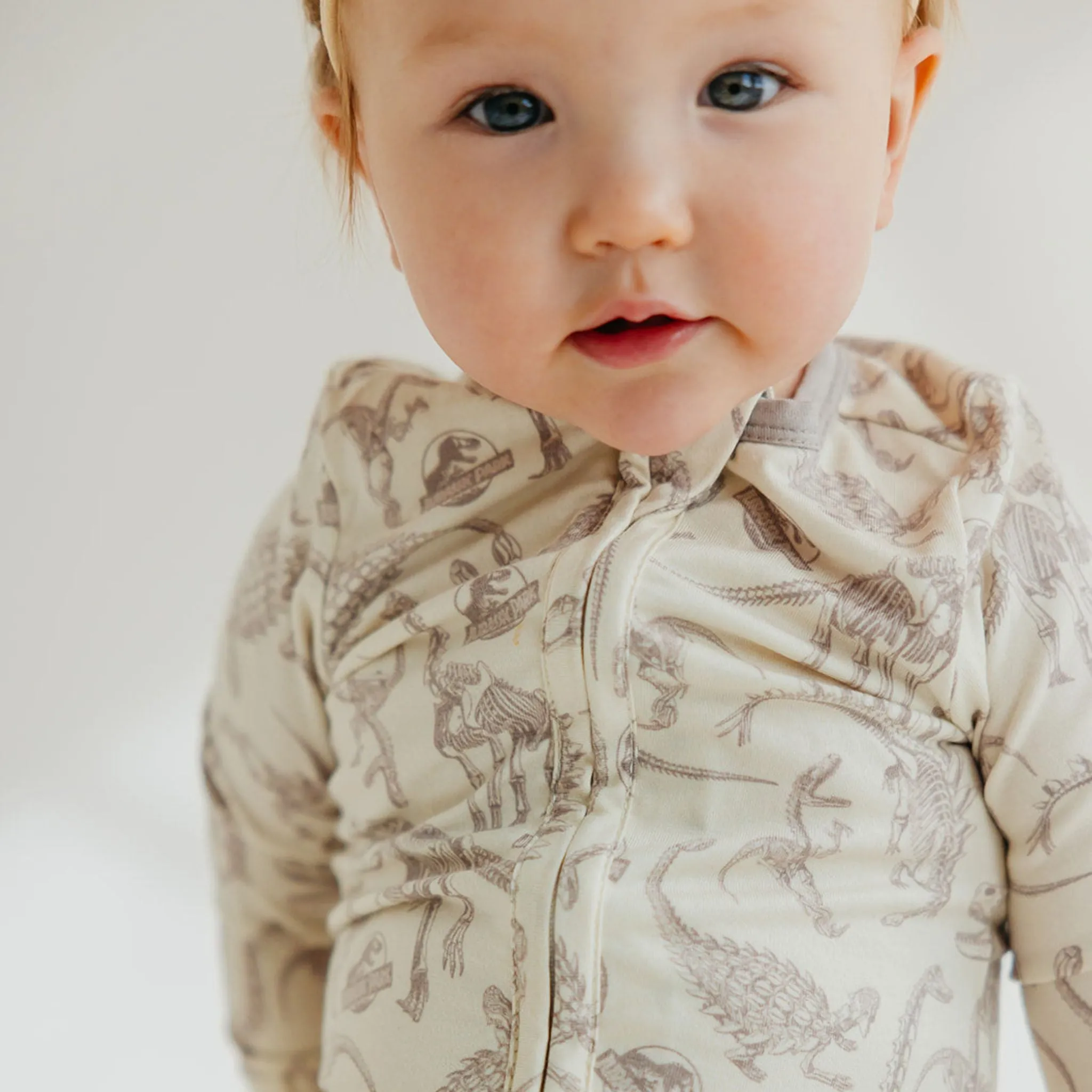 Zip-Up Footie Pajama - Jurassic Park Fossils